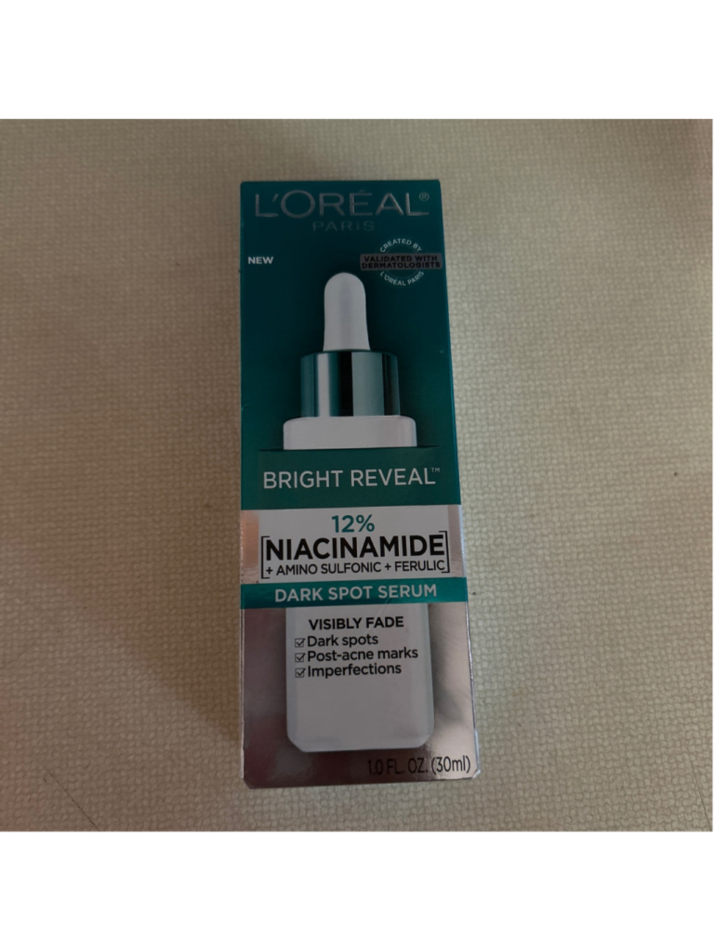 L'Oreal Bright Reveal 12% Niacinamide Dark Spot Serum, One Size, Teal/White